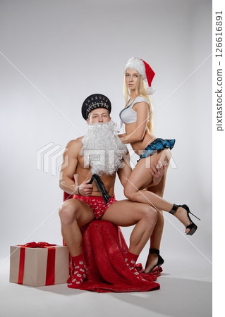Couple engages in festive roleplay with playful and seductive attire 126616891
