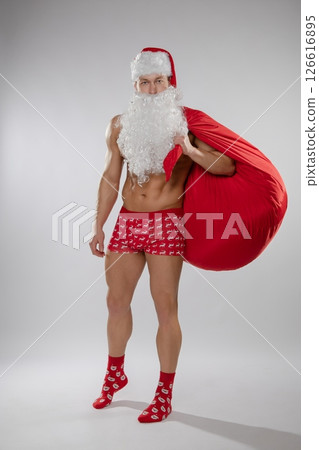 Couple engages in festive roleplay with a playful Christmas twist at home Couple engages in festive roleplay with a playful Christmas twist at home 126616895