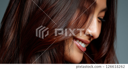 portraits of a beautiful smiling woman with luxurious, flowing chocolate brown hair. portraits of a beautiful smiling woman with luxurious, flowing chocolate brown hair. 126618262