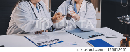 doctors and nurse having informal meeting in hospital canteen doctors and nurse having informal meeting in hospital canteen 126618661