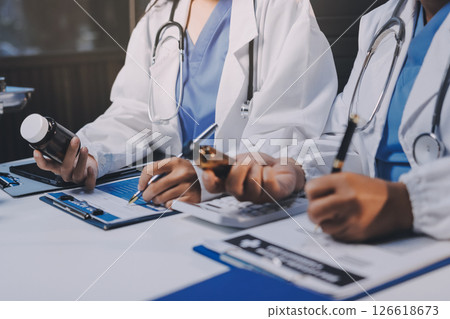 doctors and nurse having informal meeting in hospital canteen doctors and nurse having informal meeting in hospital canteen 126618673