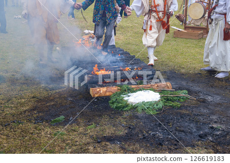 Women participating in a fire walking ceremony 126619183