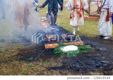 Women participating in a fire walking ceremony 126619184