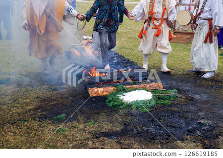 Women participating in a fire walking ceremony 126619185