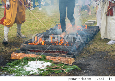 Women participating in a fire walking ceremony 126619217