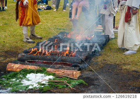 Father and son participating in the fire walking ceremony 126619218