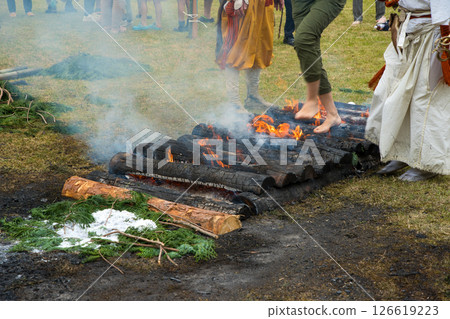 Women participating in a fire walking ceremony 126619223
