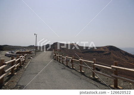 March 25 2025 Scenic Path with Wooden Fence in a Mountainous Landscape, Japan March 25 2025 Scenic Path with Wooden Fence in a Mountainous Landscape, Japan 126620522