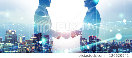 Collage of multinational business people shaking hands and communication network 126620941
