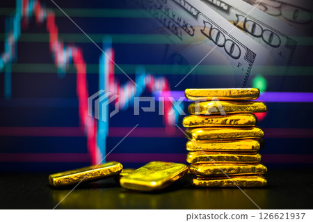 Photo a gold bars the candlestick chart and US dollar background , Fluctuations in gold prices concept. Photo a gold bars the candlestick chart and US dollar background , Fluctuations in gold prices concept. 126621937