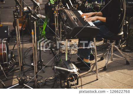 Street performance, Street live, Hands of a man playing a keyboard, No face Street performance, Street live, Hands of a man playing a keyboard, No face 126622768