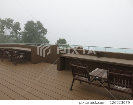 The rooftop terrace of Lake Mashu Kamui Terrace (Lake Mashu First Observation Deck) and Lake Mashu in the mist The rooftop terrace of Lake Mashu Kamui Terrace (Lake Mashu First Observation Deck) and Lake Mashu in the mist 126623079