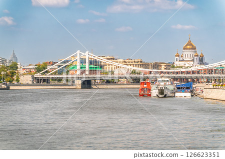 Cruise ship sails on the Moscow river in Moscow city center, popular place for walking. 126623351