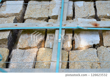 Stones piled up at a landscaping construction site 126623532