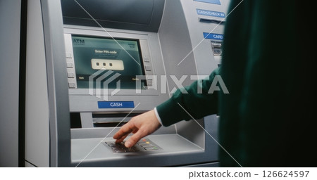 Unrecognizable Person Entering PIN Code. Error Message on Cash Machine Due to Incorrect PIN Code Unrecognizable Person Entering PIN Code. Error Message on Cash Machine Due to Incorrect PIN Code 126624597