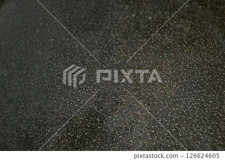 Rust stains on cast iron surface, macro 126624605