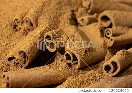 Ground Cinnamon and Cinnamon Sticks. Natural Flavors and Ingredients. 126624623