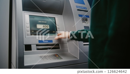 Unrecognizable Person Entering PIN Code. Error Message on Cash Machine Display Due to No Cash Available 126624642