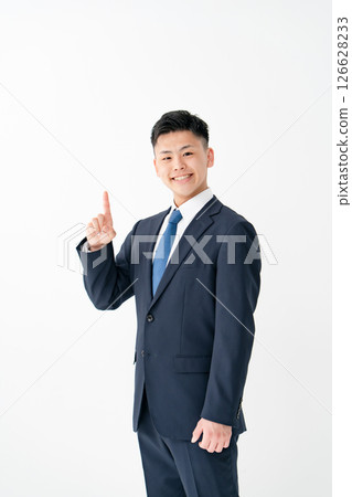 Young male business pointing 126628233