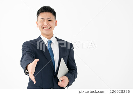 Young men business handshake Young men business handshake 126628256