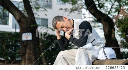 Craftsman, Nikkapokka, tired, sitting Craftsman, Nikkapokka, tired, sitting 126628423