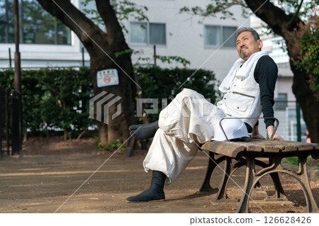 Craftsman, Nikkapokka, tired, sitting 126628426