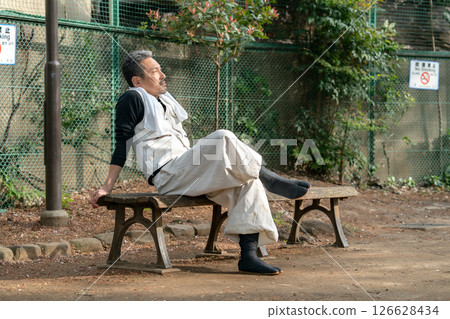 Craftsman, Nikkapokka, tired, sitting 126628434