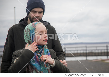 Perfect young couple. Man and woman in love, outdoors lifestyle portrait Perfect young couple. Man and woman in love, outdoors lifestyle portrait 126628915