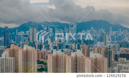 Skyline Of Hong Kong Under Cloudy Skies With Vibrant Cityscape 126629256