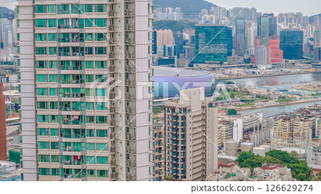 High rise Buildings Overlooking River and Modern Cityscape High rise Buildings Overlooking River and Modern Cityscape 126629274