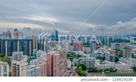 Urban Cityscape with Mountains in the Background 126629289