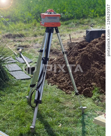 Red laser is leveling device central device to level construction site Red laser is leveling device central device to level construction site 126629357