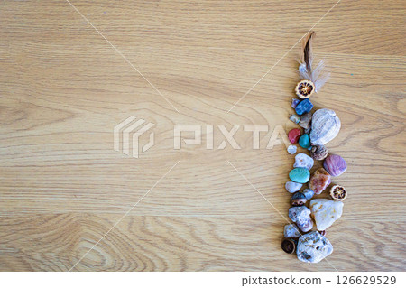 Colorful hobby collection, natural sea summer object on wooden surface background with copy space. 126629529