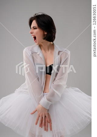 Dance of femininity in lingerie and ballet wear in a studio setting 126630051
