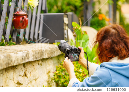 Woman take photo outdoors Woman take photo outdoors 126631000