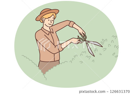Woman gardener uses large scissors to shape bushes and remove diseased twigs Woman gardener uses large scissors to shape bushes and remove diseased twigs 126631370