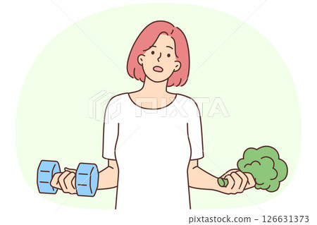 Woman holding dumbbells and broccoli wanting to choose way to lose weight 126631373