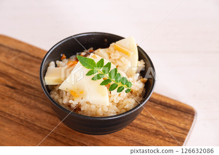 Bamboo shoot rice served in a rice bowl Bamboo shoot rice served in a rice bowl 126632086