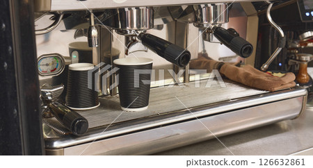 Coffee brewing at a cafe during morning hours 126632861
