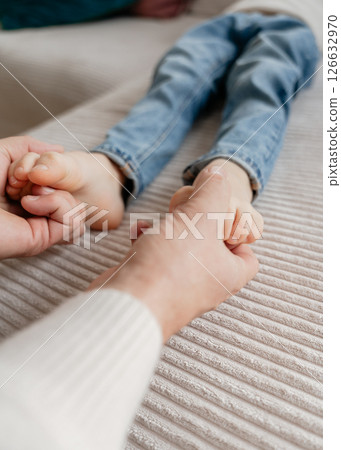 baby feet, boy feet, foot massage, dad tickles son's feet, foot tickling . High quality photo baby feet, boy feet, foot massage, dad tickles son's feet, foot tickling . High quality photo 126632970