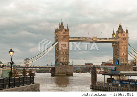 The stunning view of Iconic Tower Bridge with sky in the background after sunset. The stunning view of Iconic Tower Bridge with sky in the background after sunset. 126633091