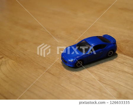Blue miniature car Copy space Longing for a sports car The joy of admiring cars Let's try various challenges Blue miniature car Copy space Longing for a sports car The joy of admiring cars Let's try various challenges 126633335