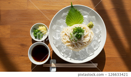 Chilled somen noodles with ice and condiments for a refreshing taste Chilled somen noodles with ice and condiments for a refreshing taste 126633421