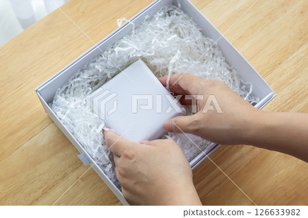 Eco friendly white paper wrap for product packaging parcel carton box 126633982