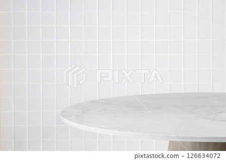 Empty white round marble table top with blur tile wall bathroom background 126634072