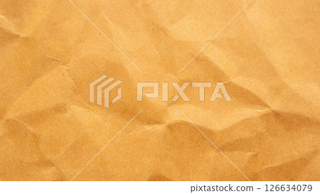 Abstract crumpled and creased recycle brown paper texture background 126634079