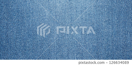 Old denim blue jeans fabric texture background Old denim blue jeans fabric texture background 126634089