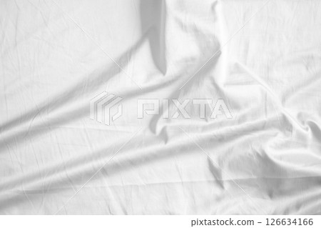 Abstract white wrinkled bedding sheet fabric texture background Abstract white wrinkled bedding sheet fabric texture background 126634166