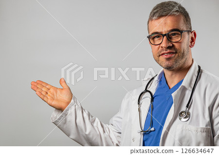 Medical professional presenting health information with a friendly demeanor Medical professional presenting health information with a friendly demeanor 126634647