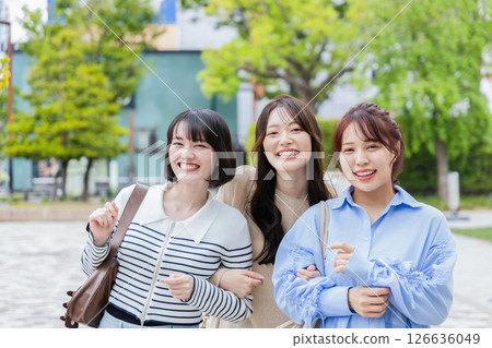 Woman with arms folded 126636049